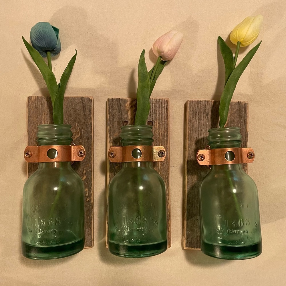 New, never used Mason Jar Vases. Set of three. Each measure 3.5” x 8”